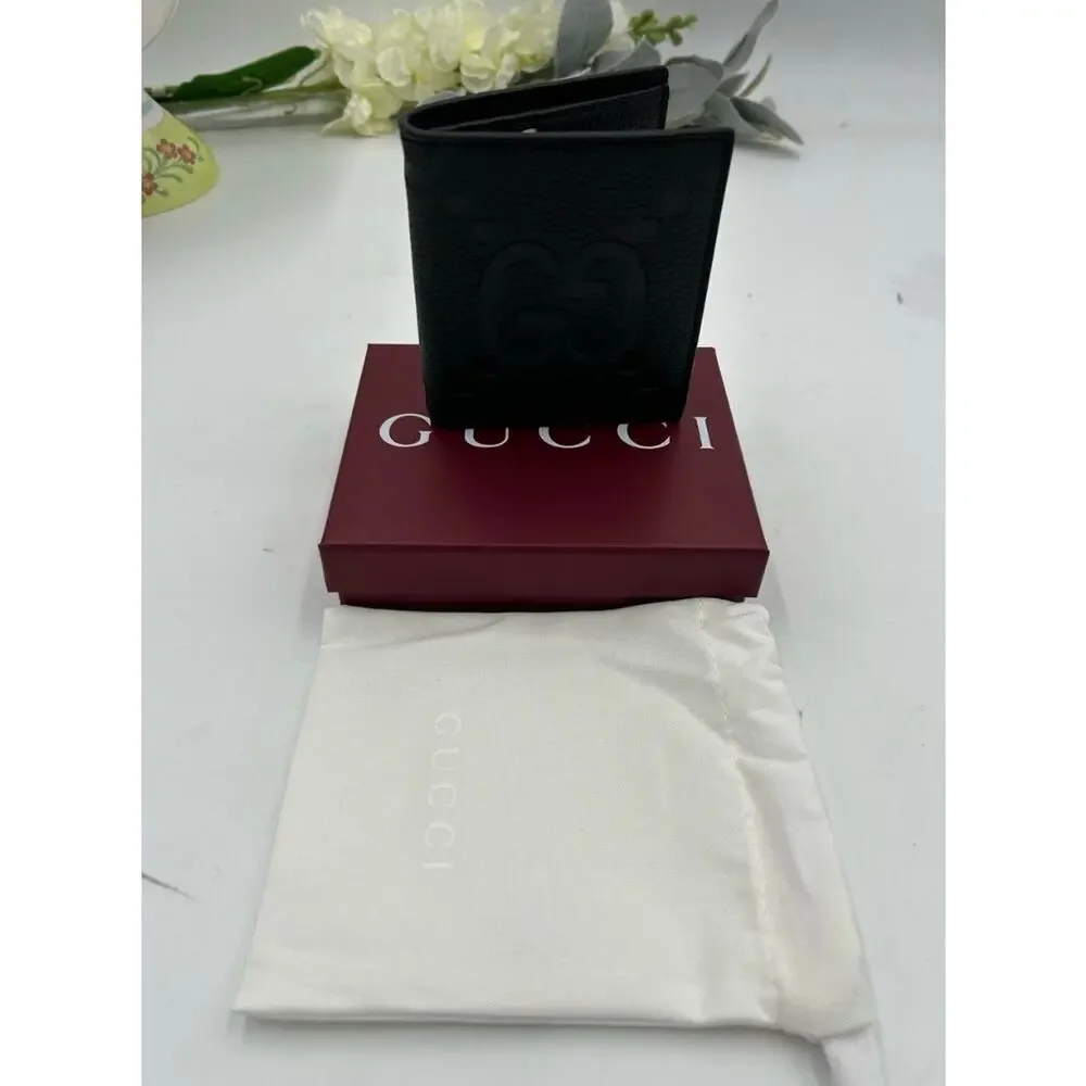 Men's Gucci jumbo GG Leather bifold wallet made in Italy